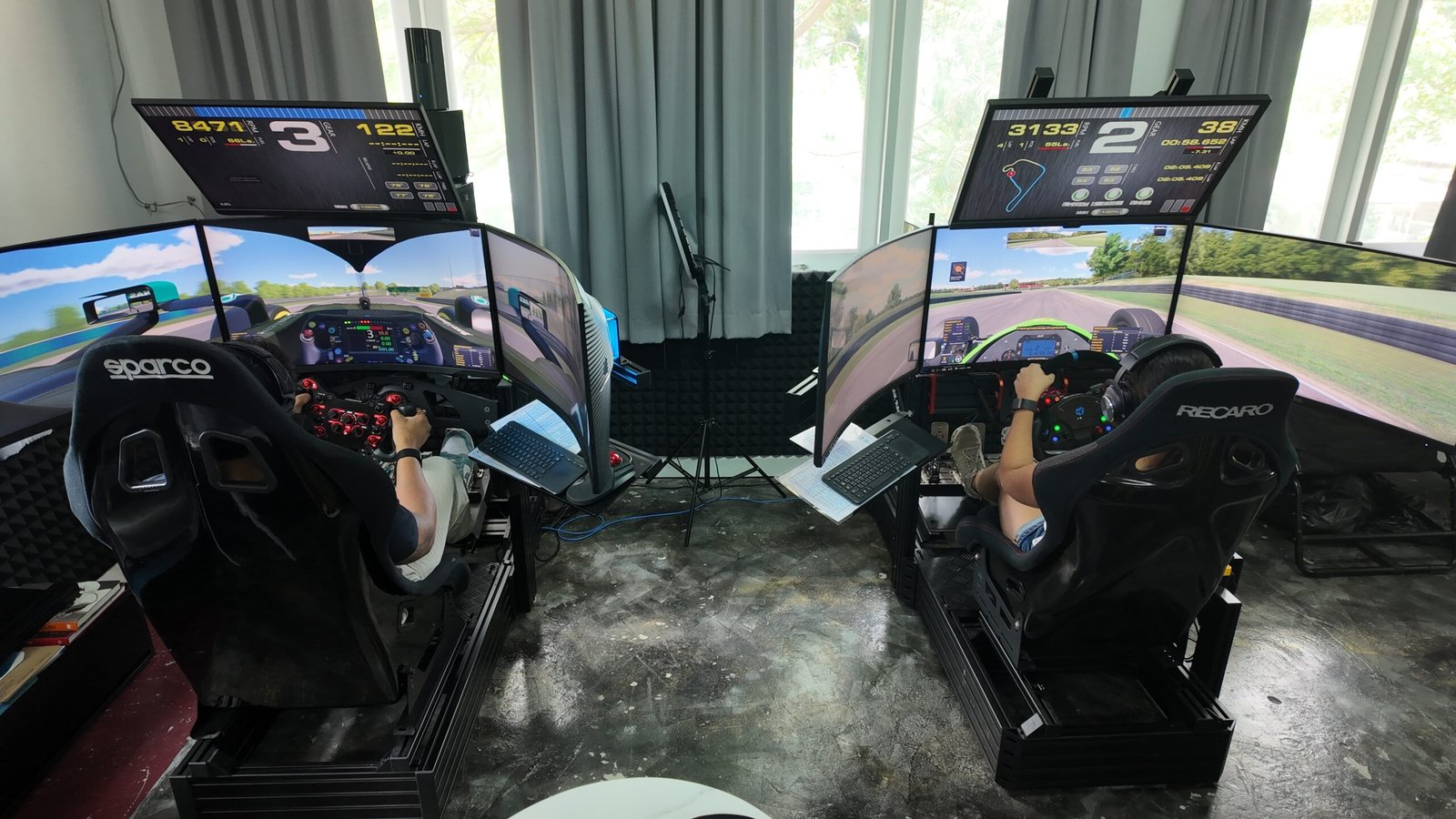 Triple 32-inch monitors at SIMPRO Academy Phuket give guests the peripheral vision Zandvoort's Dutch Grand Prix 2026 banking demands.