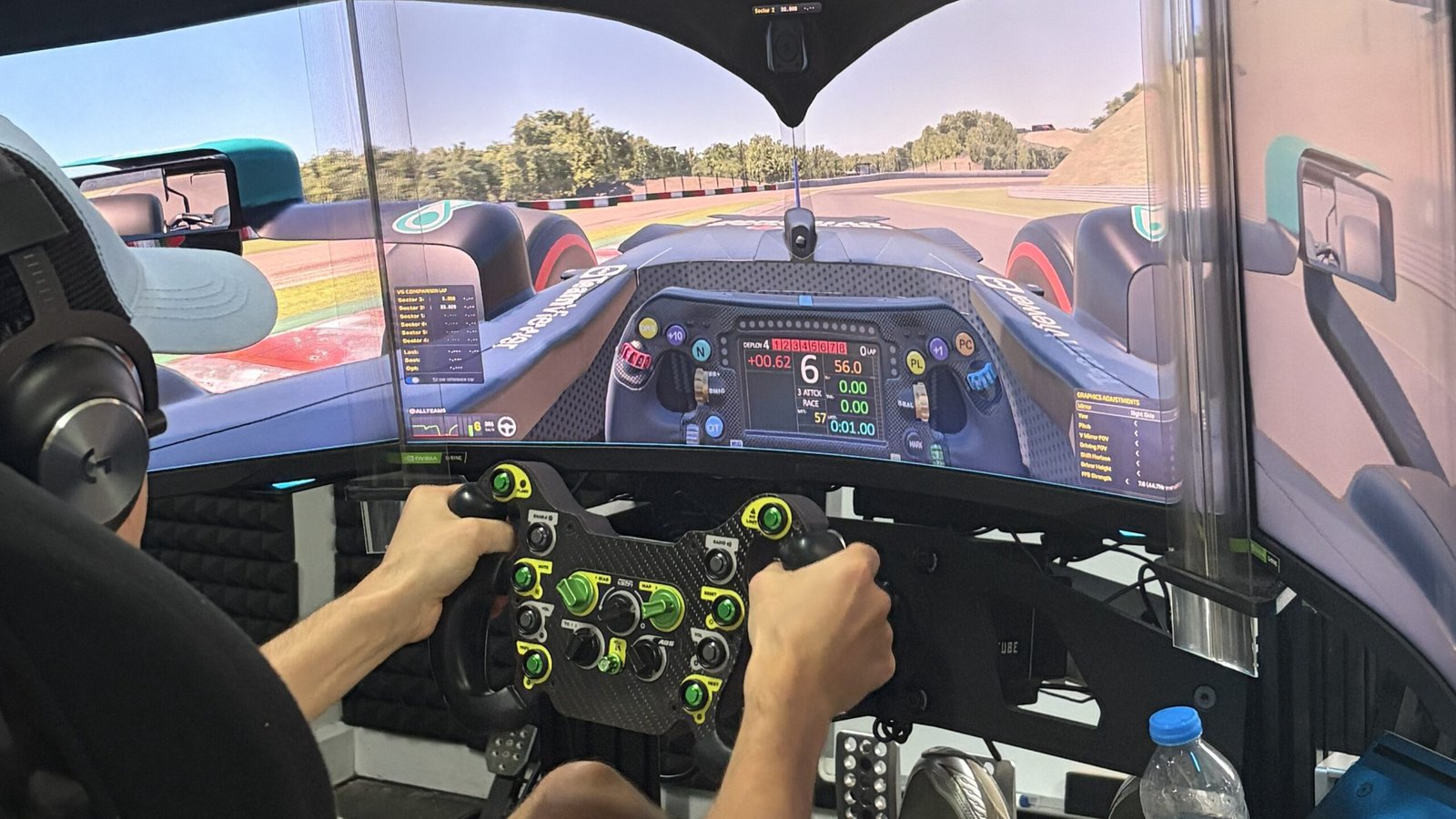 Sim racer taking the Maggotts and Becketts sequence at Silverstone on a Simucube 2 Pro simulator with triple 32-inch curved monitors at SIMPRO Academy Phuket