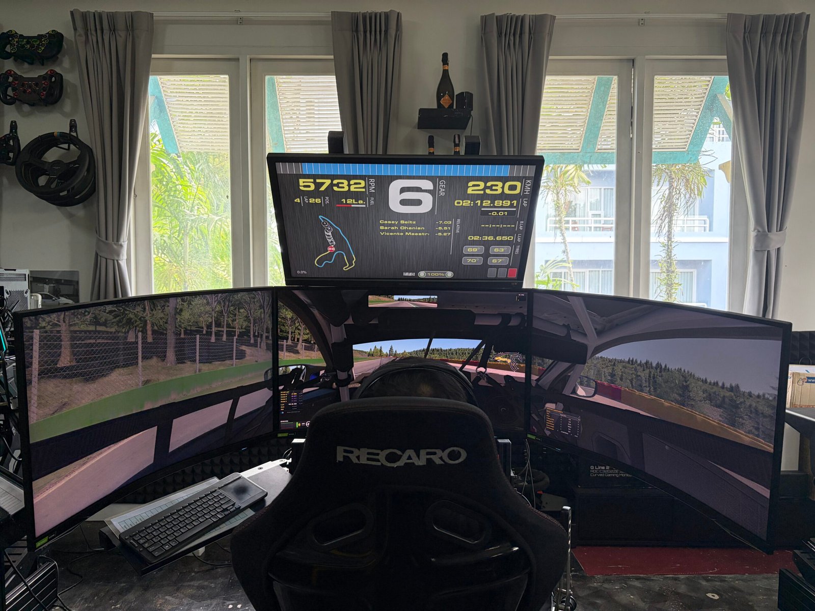 Triple 32-inch curved monitors and a 25 Nm Simucube 2 Pro base bring Gamescom 2026 sim racing hardware to life at SIMPRO.
